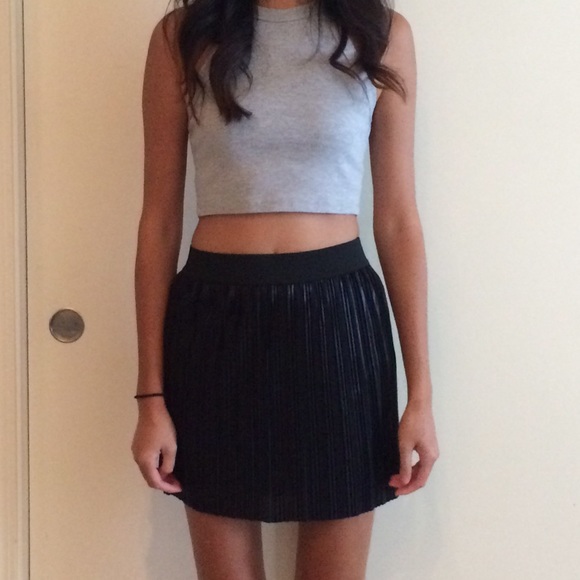 Black mini skirt. Pleated