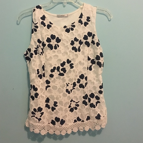 A floral, lace and crochet like blouse