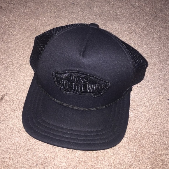 Black on black Vans trucker hat
