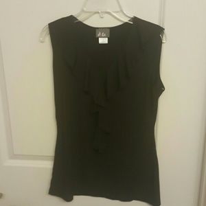 Black top with frill down the front