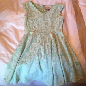 Green and white lace dress