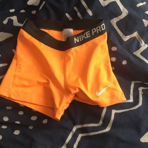 Orange Nike pro
