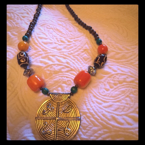 Orange Beads with sliver Locket