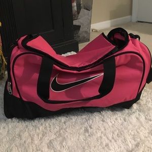Nike small pink duffel bag