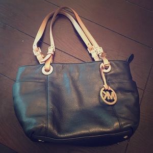Black and Gold Michael Kors Arm Bag