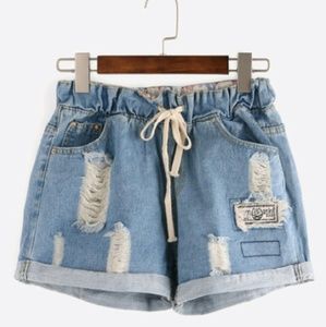 Ripped waist blue denim shorts
