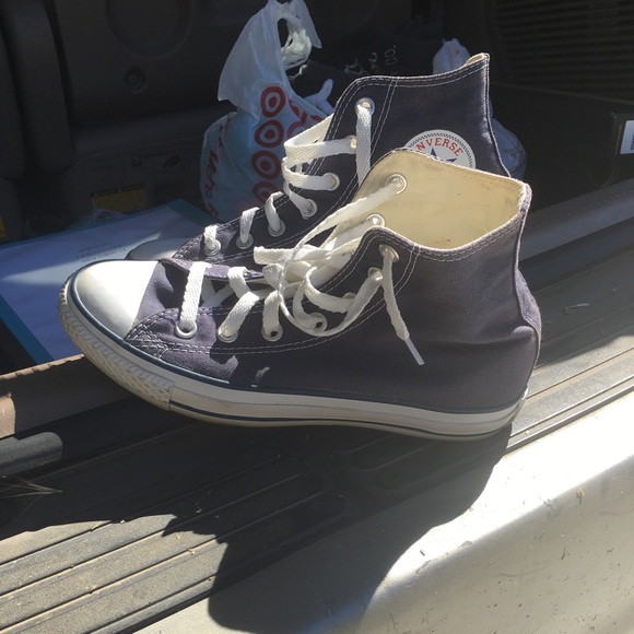 Navy blue converse high tops on hold