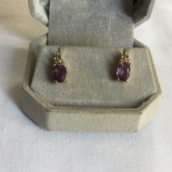 Earrings with simulated stones.