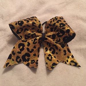 Gold cheetah cheerleading bow