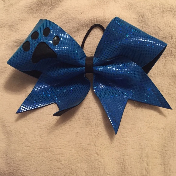 Blue paw print cheerleading bow