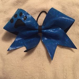 Blue paw print cheerleading bow