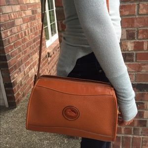 Classic Dooney & Bourke cross-body 11 x 3 1/2 x 8.