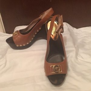 Michael kors wood platforms.