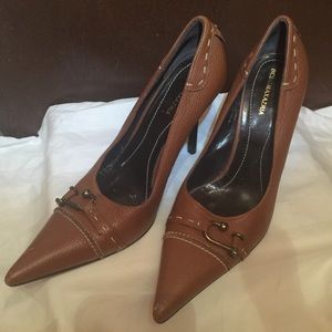 BCBG MaxAzaria classic pumps with brass accent.