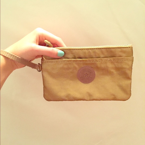 Gold Kipling wristlet