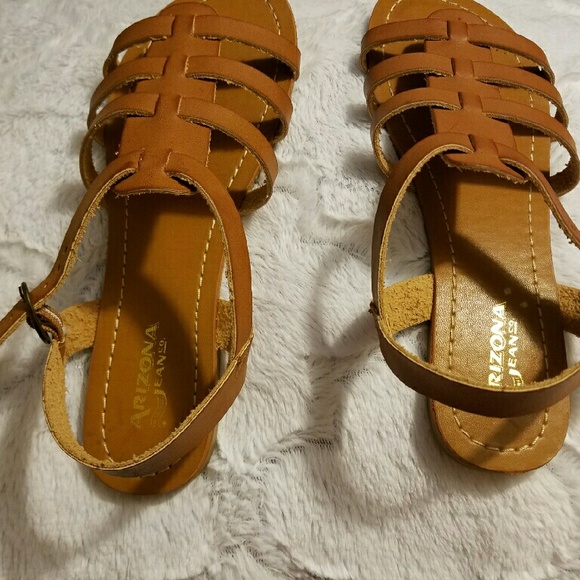 Brown buckle sandal.