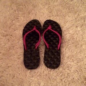 Black and purple Reef Flip Flops