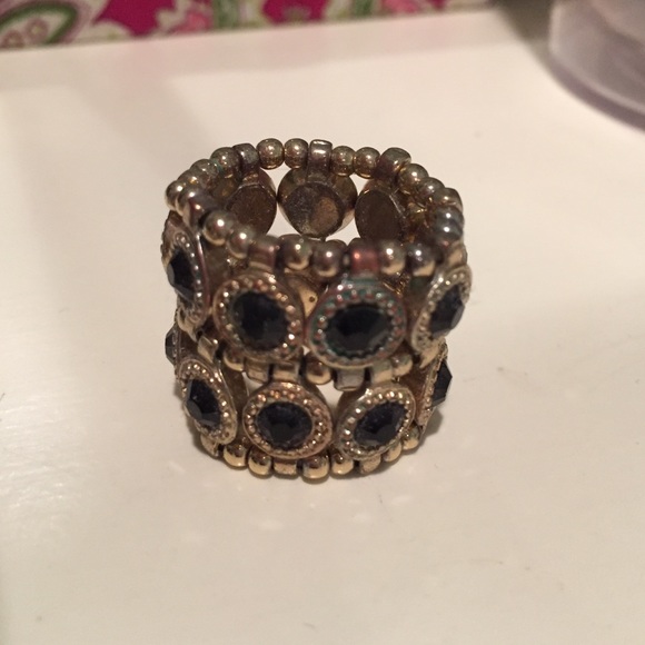 Black and gold ring