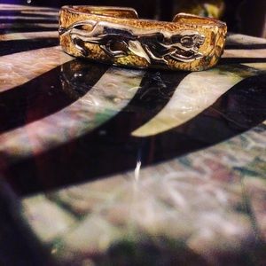 Gold and silver lion bracelet