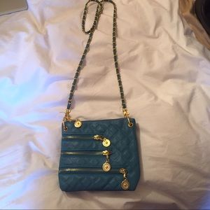Turquoise cross body bag