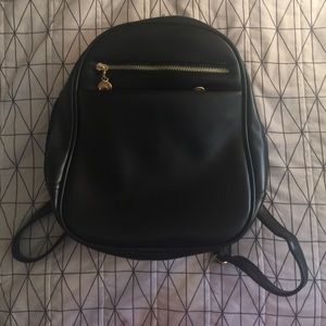 Faux leather backpack.