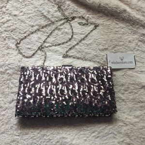 Brand new dark silver clutch