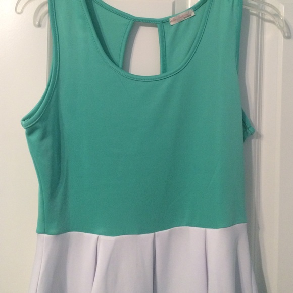 Dress purchased from Be Inspired Boutique. - Picture 2 of 2