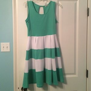 Dress purchased from Be Inspired Boutique.