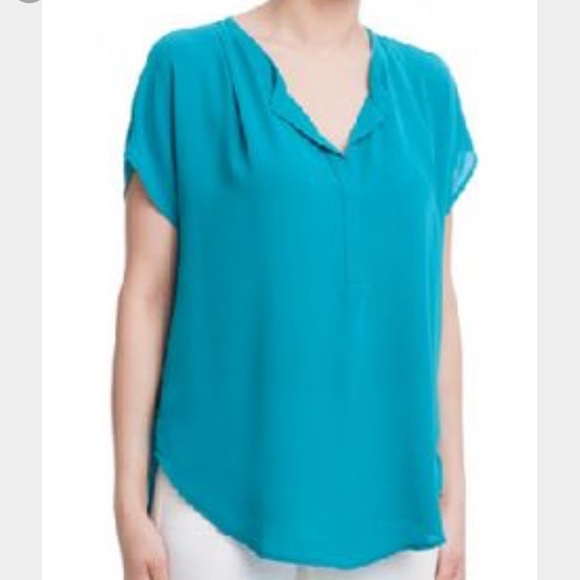 Teal blouse.