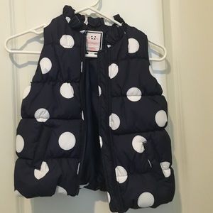 Girls navy polka dot puffer vest