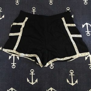 Black rayon shorts with lace detail - size L