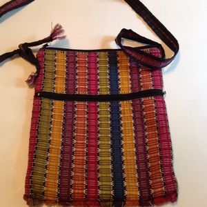 Multie color zippered over the shoulder bag