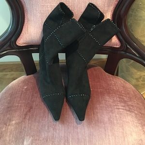 Stiletto black suede BCBG boots.  Never worn