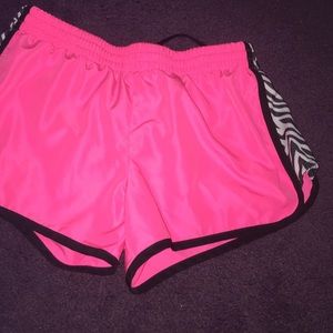 pink athletic shorts with zebra design sidings