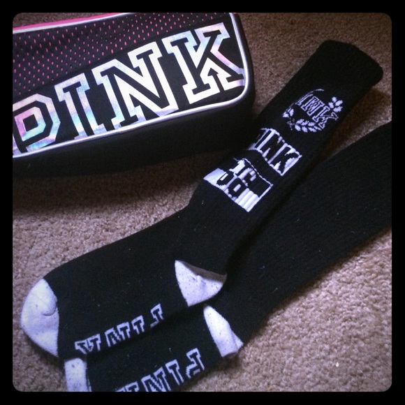Pink makeup bag with long black socks like new