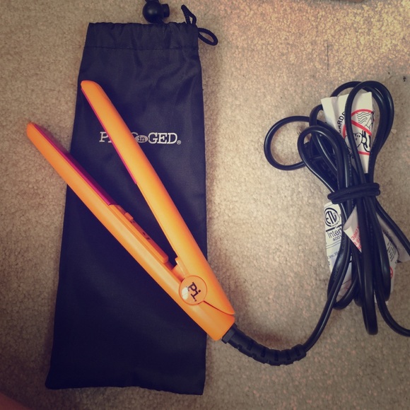 Plugged in mini straightener with travel case