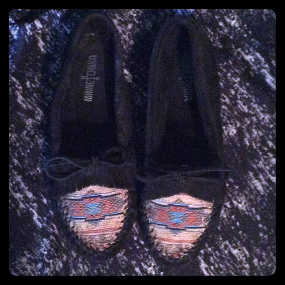 Black suede Minnetonka moccasins.
