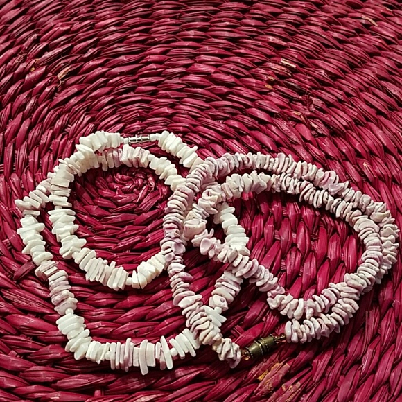 Jewelry - A pair of authentic Puka shell necklaces