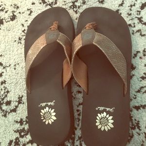 Brown yellow box flip flops