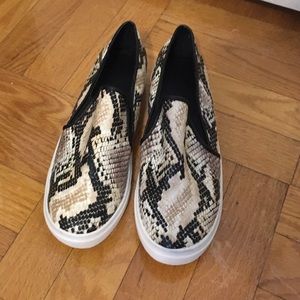 Snakeskin embossed slip-on's