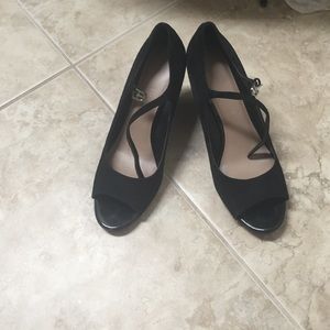 Black high heel wedges.