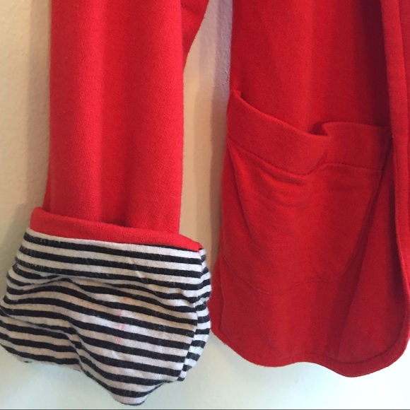 Red blazer with striped cuffs