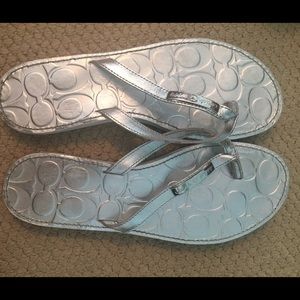 worn very few: silver coach flip flops