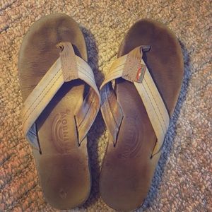 Tan rainbow flip flops
