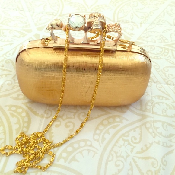 Handbags - Brass knuckle clutch. Used twice. Like new