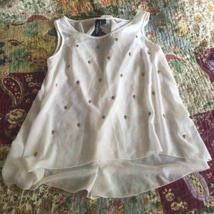 White Top with Gold Skull Accents