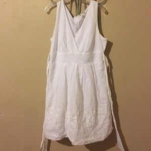 Dress with eyelet pattern on hem