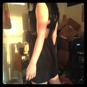 cute little black dress with a mesh back