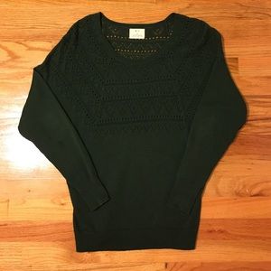 Loose to tight, lightweight detailed sweater.