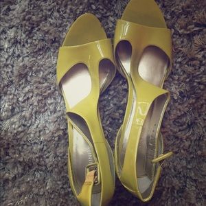Yellow patent Nine West heels.